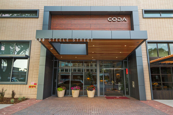 Modern entrance to CODA apartments on Steele Street.